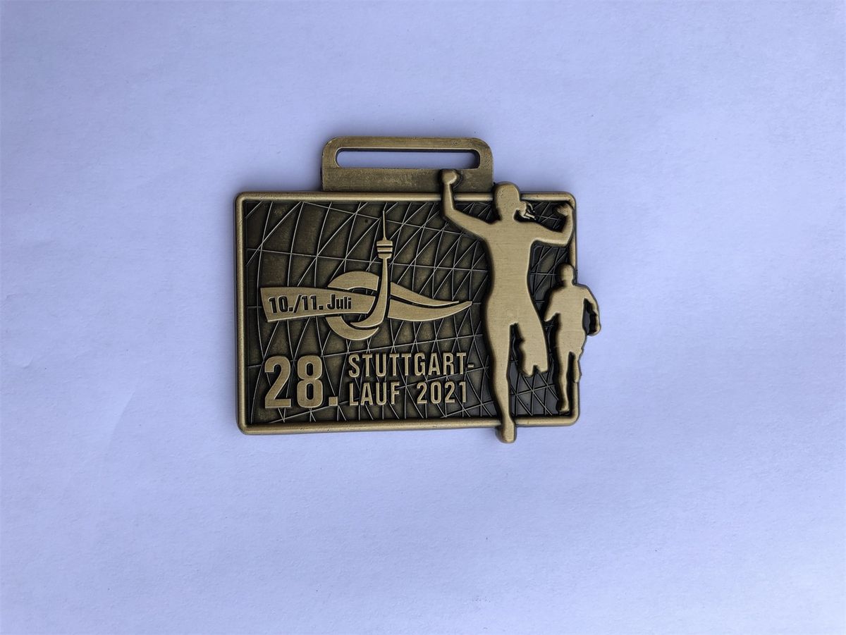  Foto zu 33. Stuttgart-Lauf - 16./17. Mai 2026: Medaille 2021 